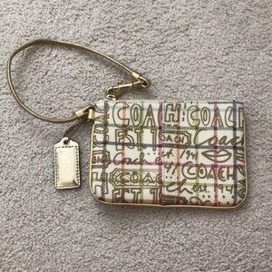 Coach gold wristlet